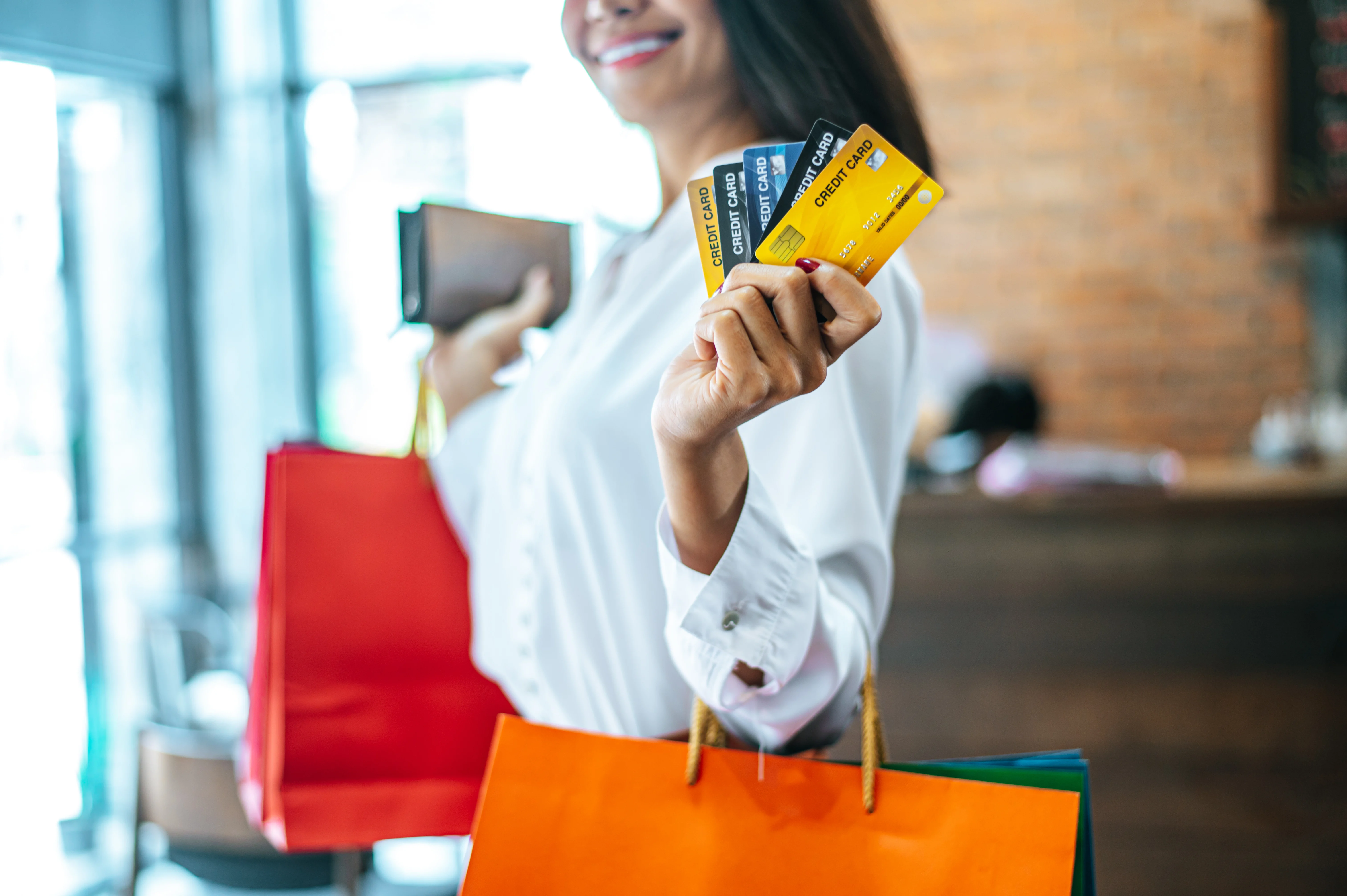young-woman-enjoy-shopping-with-credit-cards_2026-02-17_14-10-58
